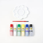 Creative kids art supplies including watercolour paints