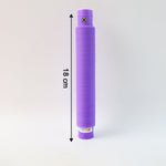 Multiple glowing LED Pop Tubes in vibrant mixed colors