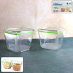 Two 500ml leak-proof food storage containers with green lids