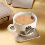 Ganesh branded heat-resistant coasters set shown for home and office use