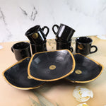 Overhead view of the complete seashell ceramic cup and bowl set.