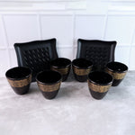 Complete 8-piece ceramic bowl and cup set elegantly displayed for dining.