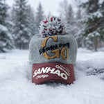 Display of woolen baseball cap with pom pom, casual winter style