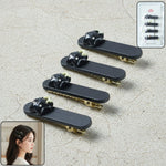 Cute cat hair clips arranged on a white background