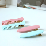Display of elegant pastel comb-style hair clips for everyday wear