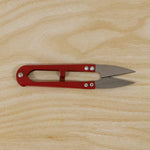 Thread cutter snip scissors angled view showing sharp blades