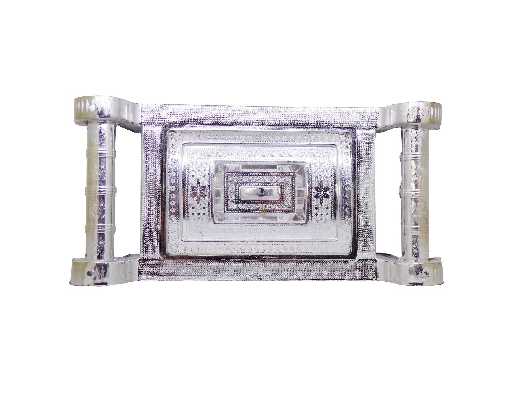 Close-up of a silver gift box with royal design, ideal for special occasions.