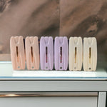Close-up shot of durable cloth drying clips on rope