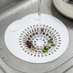 Hair catcher sink strainer in bathroom