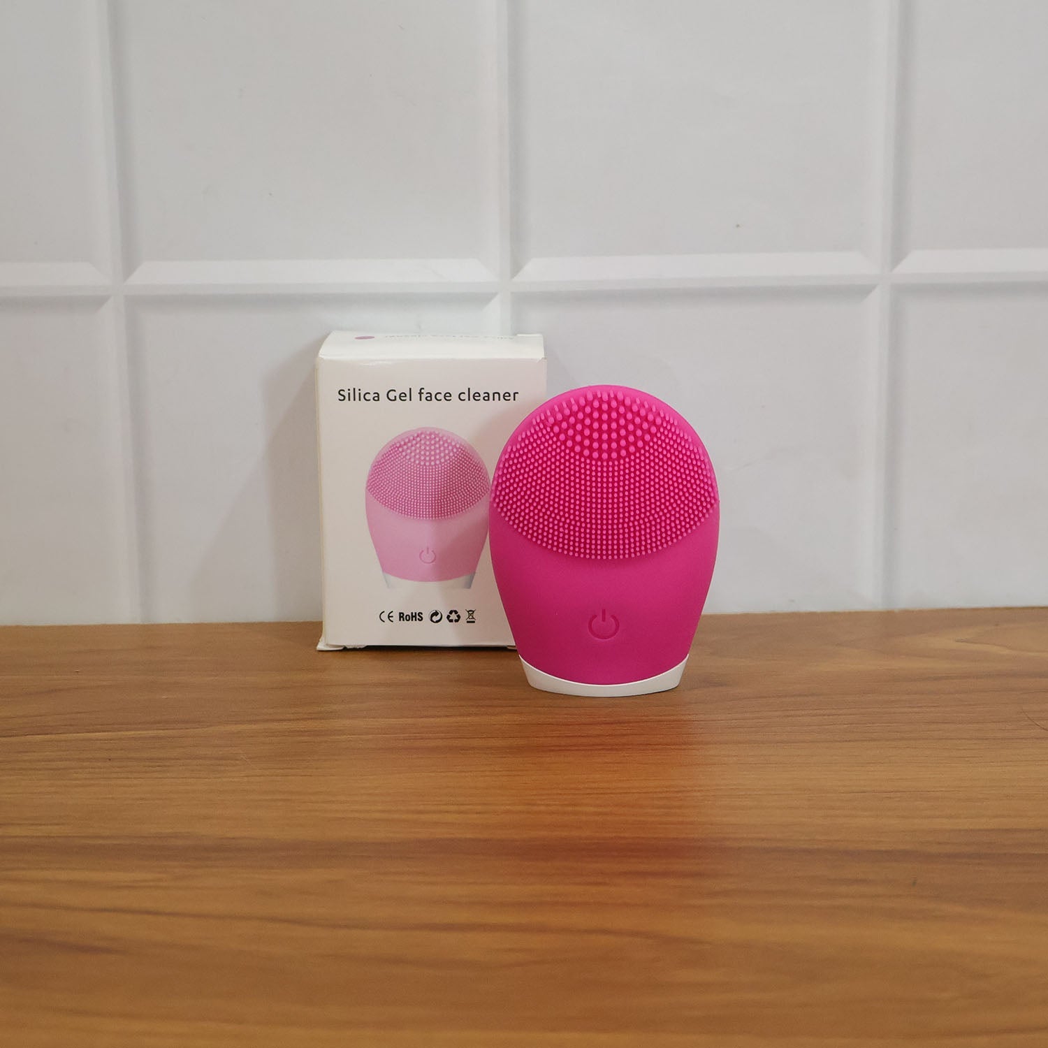 Lifestyle image showcasing the silicone facial cleansing brush in use