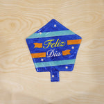 Blue star foil balloon decorating a party