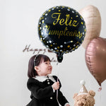 Side view of black round celebration foil balloon