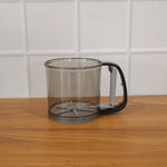 Kitchen baking gadget plastic flour sieve cup in use