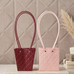 Bag used for bouquet packaging in floral shop setting
