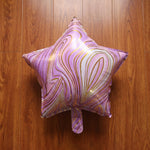 Front view of star marble foil balloon
