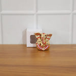 Festival gift Ganesha murti with golden decorative appearance