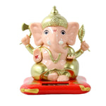 Solar Shree Ganesh idol featuring fine gold-tone ornamental details