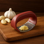 Garlic press in use crushing garlic cloves efficiently