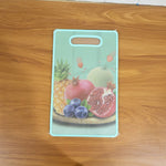 Green cutting board in kitchen setting