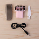 Compact vacuum cleaner with brush attachment in use