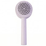 The air cushion brush gently massaging the scalp to stimulate blood circulation.