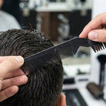 Hair cutting scissors with comb for styling