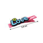 Decorative hair clip showcasing stylish text accessory