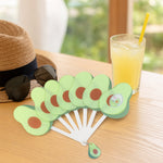 Foldable pocket fan closed inside protective case with keychain attached