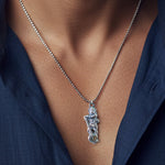 Side profile of the Hanuman Ji pendant, revealing the strong Gada motif.