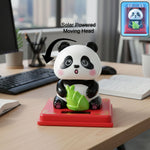 Solar powered moving head panda showpiece on red base