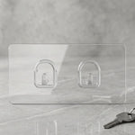 Close-up of adhesive backing on transparent wall hook