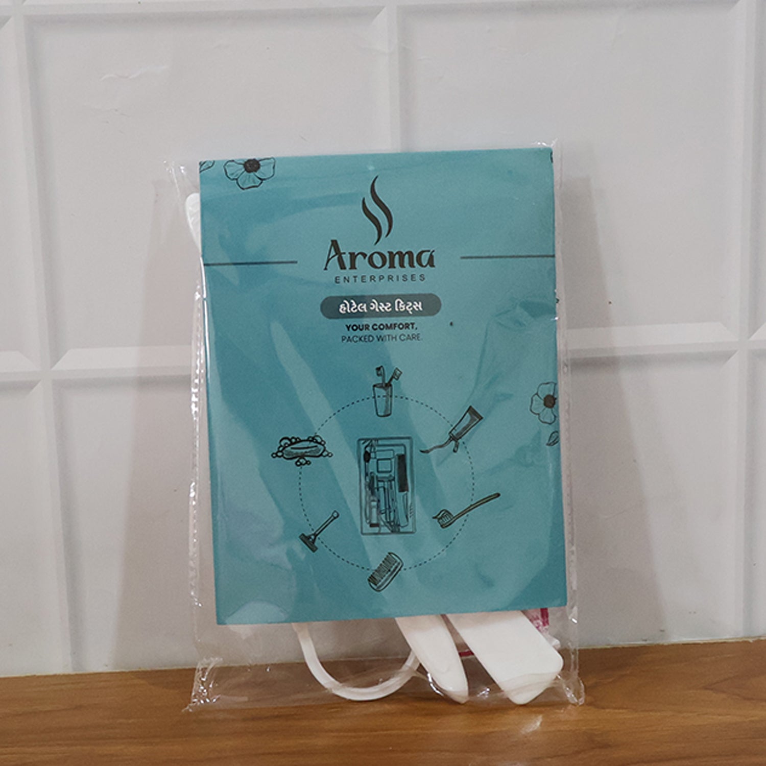 Complete hotel guest toiletry kit displayed with all items