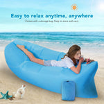 Folded blue inflatable lounger, demonstrating portability