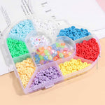 Full view of heart-shaped bead storage organizer box made from clear plastic