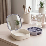 Jewelry box with compartments and mirror in use