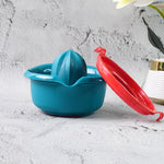 Side profile of compact manual citrus juicer designed for easy handling