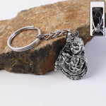 Silver finish metal keychain with detailed Bal Krishna idol charm