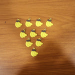 Assorted banana-shaped bag charms in set
