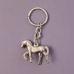 Stylish chrome horse shape keychain attached to key ring