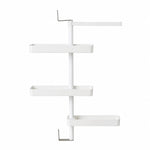 Rotating storage rack filled with kitchen items demonstrating storage capacity