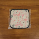 Printed heat resistant kitchen pot holder mat actively used in kitchen