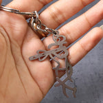 Auspicious Krishna flute style metal key holder accessory
