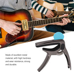 Side profile of the Wagtail guitar capo, highlighting its durable plastic construction.