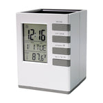 LCD display of digital desk clock showing time, date, and temperature clearly