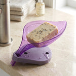 Top-down view of a leaf design soap stand with drainage slots.