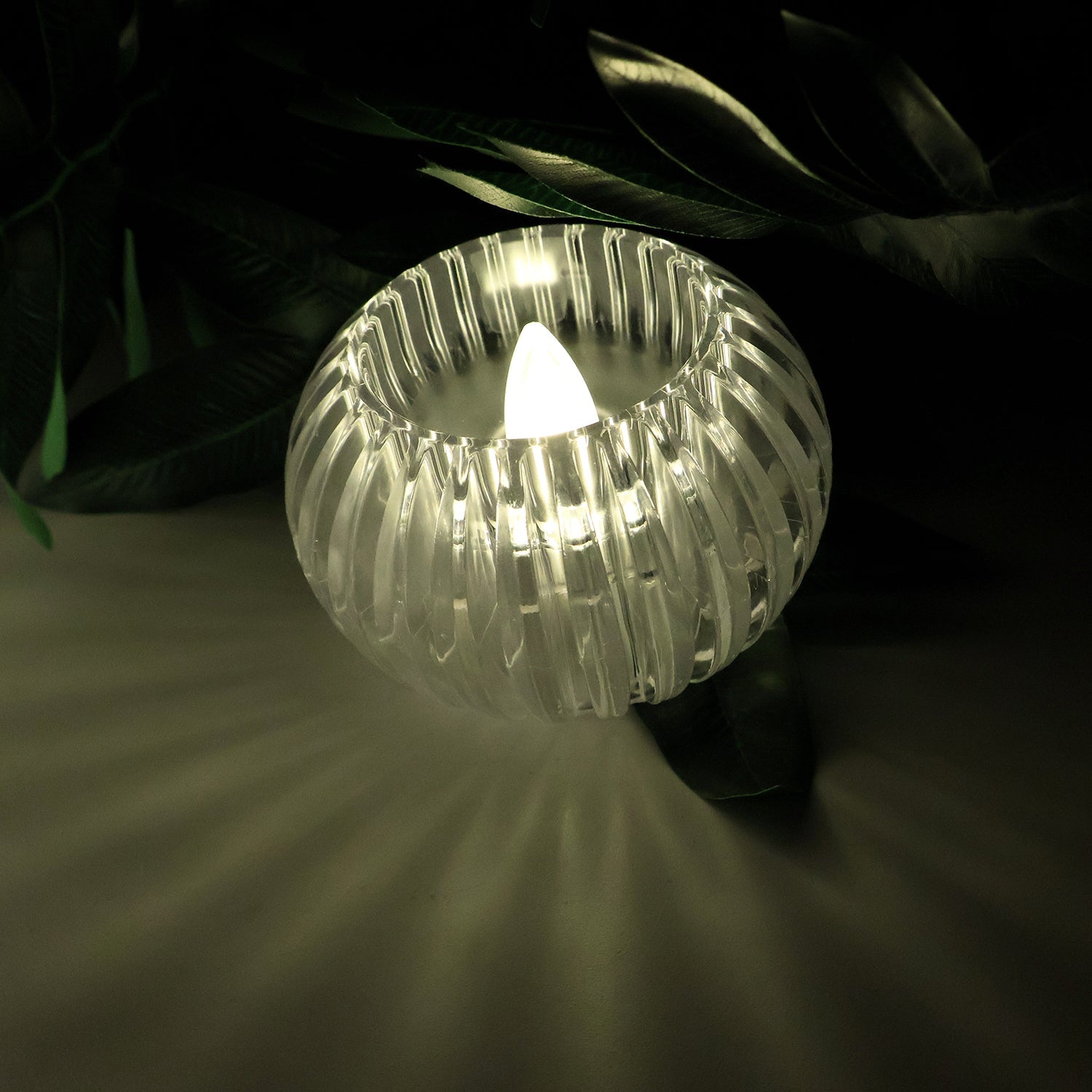 Transparent crystal-effect LED flameless tealight candle with flickering light