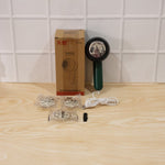 Live demonstration of electric lint remover in use