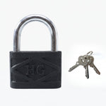 Heavy Duty Padlock securing a sturdy metal gate, demonstrating real-world application.