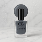 Swatch of long-lasting Calm Grey Matte Nail Polish on skin.