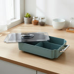 Transparent lid on 4 compartment food storage container for easy visibility of dry food items